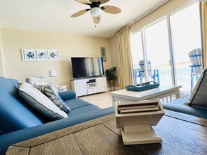 Living room Smart 55” TV, & Cable,  and great for streaming football, Movies