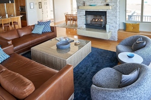 Living room with swivel chairs to enjoy the view.