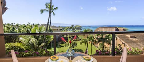 lanai seating area with ocean and mountain views