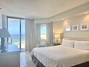 The master has a king bed, balcony access, en-suite bathroom, and walk in closet