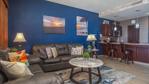 living room with beautiful blue accent wall