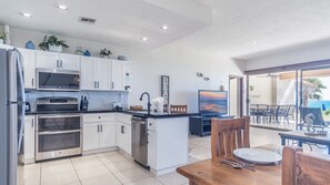 This newly remodeled condominium is one of the roomiest that you will find with 3 bedrooms, 3 full baths and extra large living room on the ground floor, just steps to the pool and beach.