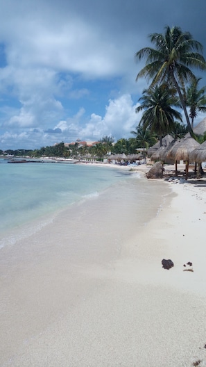 Stroll the beach early and hear the waves gently rolling in.