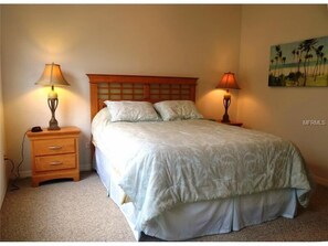 Master bedroom suite, queen bed, has a full bathroom