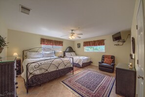 Master bedroom with a king size bed and a queen size bed!