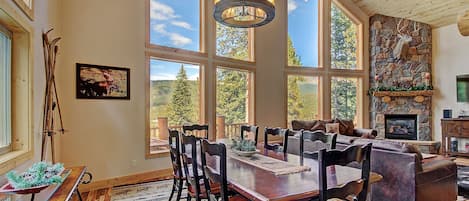 Grand Moose Lodge - a SkyRun Breckenridge Property - Dining room view into living room