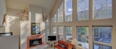 Aspen House - a SkyRun Breckenridge Property - Living Room with large picture windows