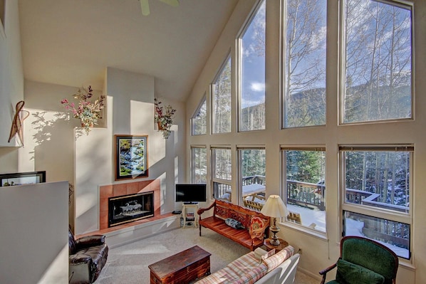 Aspen House - a SkyRun Breckenridge Property - Living Room with large picture windows