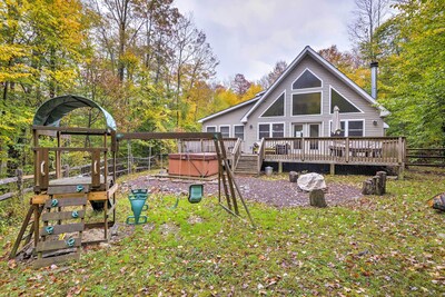 A serene mountain retreat awaits at this vacation rental cabin in Pocono Lake.