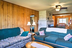 One of the sofas in the living room doubles as a pullout bed for additional sleeping arrangements.
