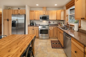 Cascade Pines: - Fully stocked kitchen with stainless appliances.