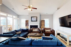 The main living space has plenty of room to entertain and a large flat screen to watch the big game