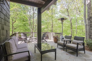 Patio area & newly added deck w/additional seating.