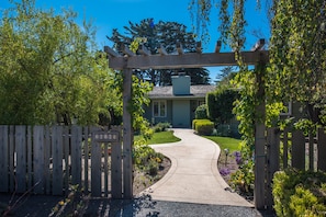 Enter Under the Garden Arbor