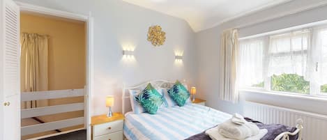 Main bedroom overlooking a quiet street