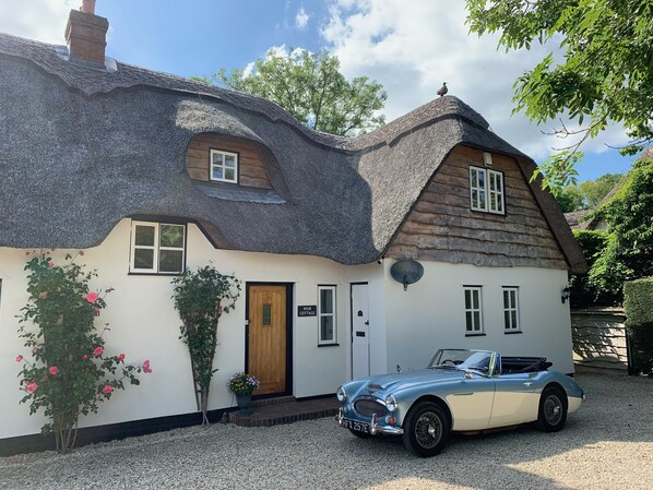 Weir Cottage to left and Duck Cottage to right. Guest, Mark, hired car as can u