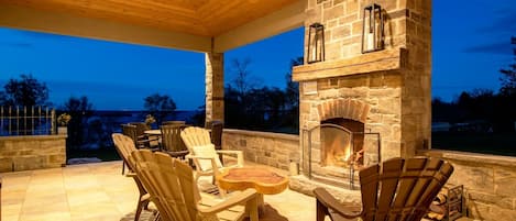 At Loyalist House enjoy the covered patio with a wood burning fireplace!