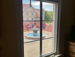 View of village square and water fountain from the kitchen window. 