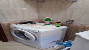 laundry machine with detergent and hairdryer 