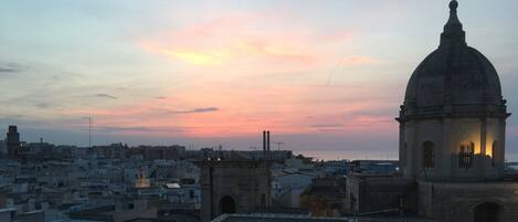 On the roof terrace at dusk