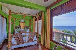 Cocoa Suite (Queen). Private, with picturesque Caribbean Sea views.
