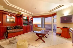 Reading Room with Wood Fireplace and TV
