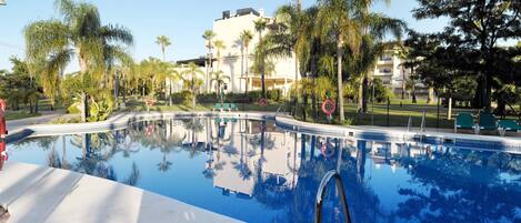 Beautiful communal pool with lifeguard