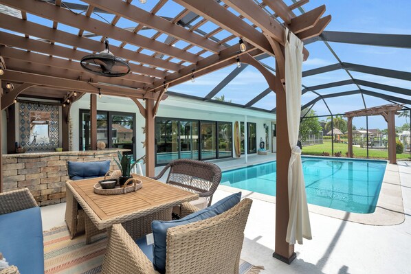 Poolside lounging with water views