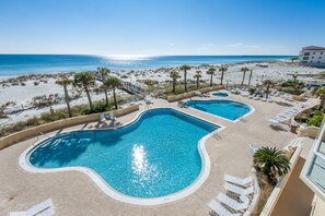 Emerald Isle sundeck with pools and hot tub