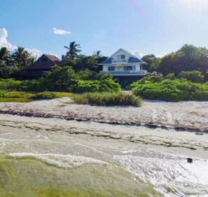 View from sea towards house
