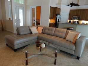 BS3599 - Inviting leather sectional couch and flat screen TV in the living