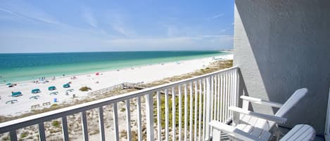 Private balcony overlooking the sand.  Watch dolphins play.