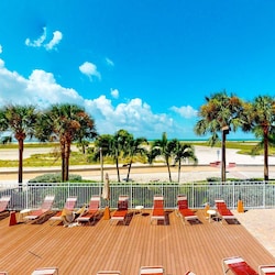 Private Beachfront Balcony Overlooking the Resort Lounge Area and the Treasure Island Beach