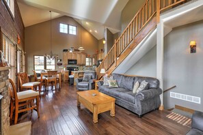 Walk over and turn on the gas fireplace in the living area.