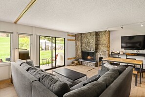 New flooring creates a bright and modern look in this mountainside vacation rental.