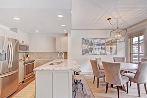Modern kitchen and dining room.