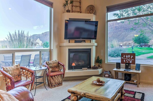 Kick back in the living room for mountain views through the large windows.