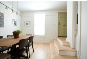 The main entrance opens up in to the dining room.