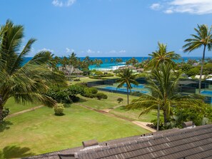 Kahala 312 birdseye view to Poipu Beach - A birdseye view from the Kahala 312 rooftop - just a short walk from the tennis courts, and world-class Poipu beach!