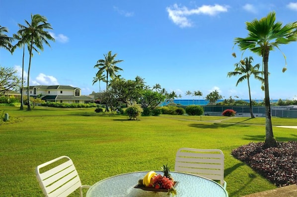 Kahala Lanai - Kahala Poipu Kai 312 is a ground floor, two bedroom, two bathroom end unit with outstanding views and a lanai with ocean views. A portable A/C is located in the living area for your comfort.