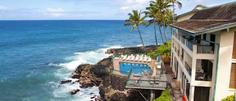 View from master lanai. - Outstanding view of the most scenic pool in Poipu with swaying palms in the background.