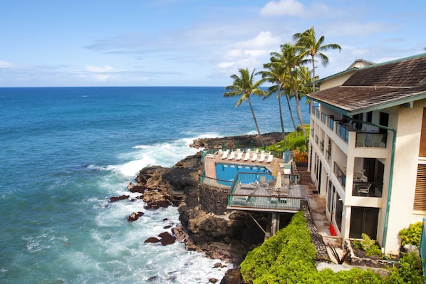 View from master lanai. - Outstanding view of the most scenic pool in Poipu with swaying palms in the background.