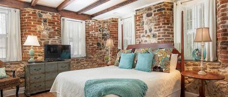 Habersham 1 Luxurious Primary Bedroom with King bed and TV