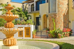 Exterior of villa with gorgeous fountain