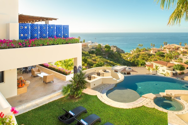 Patio with infinity pool and ocean view