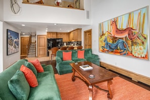 Open living area - Awesome artwork throughout the 3 bedroom condo