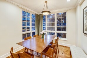 Dining area - Seating for six in the dining room. Gorgeous new walnut table and walnut chairs and bench.