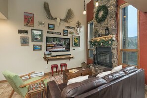 Main Living Space - TV and wood burning fireplace (firewood provided)