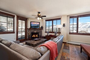 Main Living Space and Dining - TV, Gas fireplace and awesome views