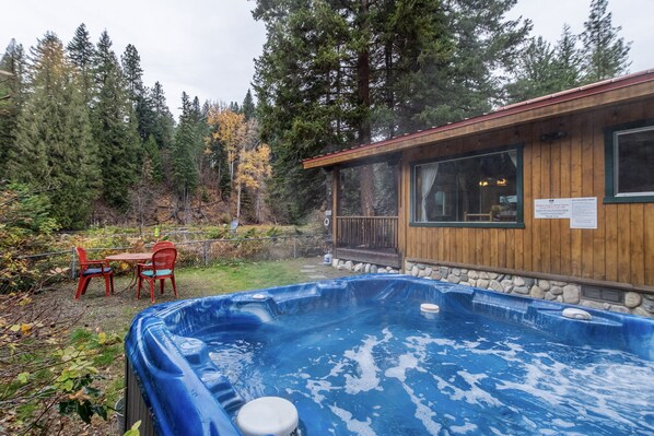 Year round private uncovered hot tub